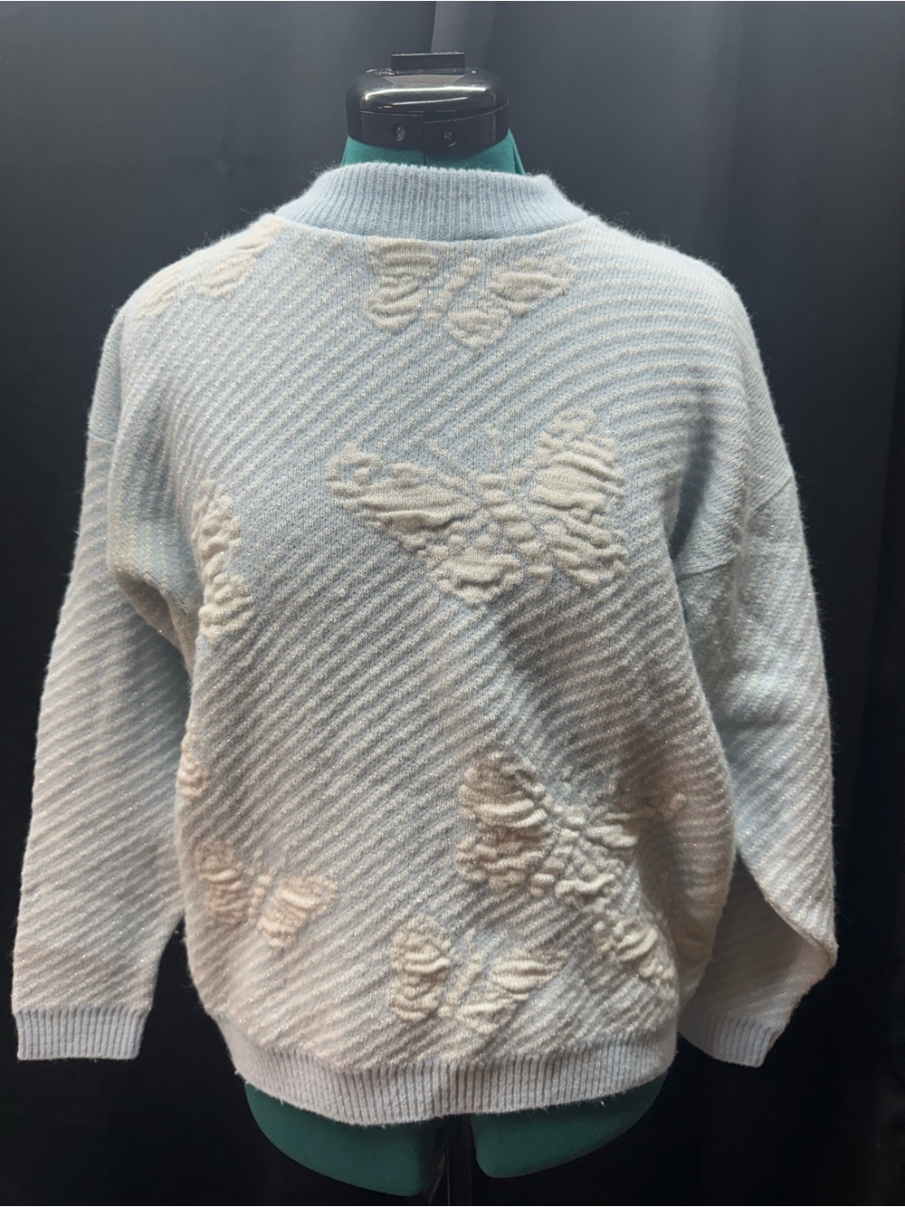Light Blue Crewneck Sweater with Cream Butterfly Detail